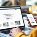 A small business owner reviewing a conversion-focused website design on a laptop, illustrating small business website design best practices for 2026